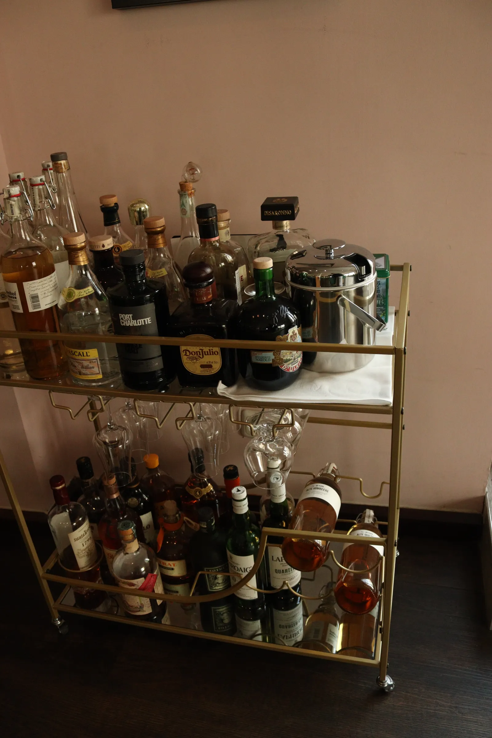 Bar Cabinets 5 Home bar cart with bottles and glassware