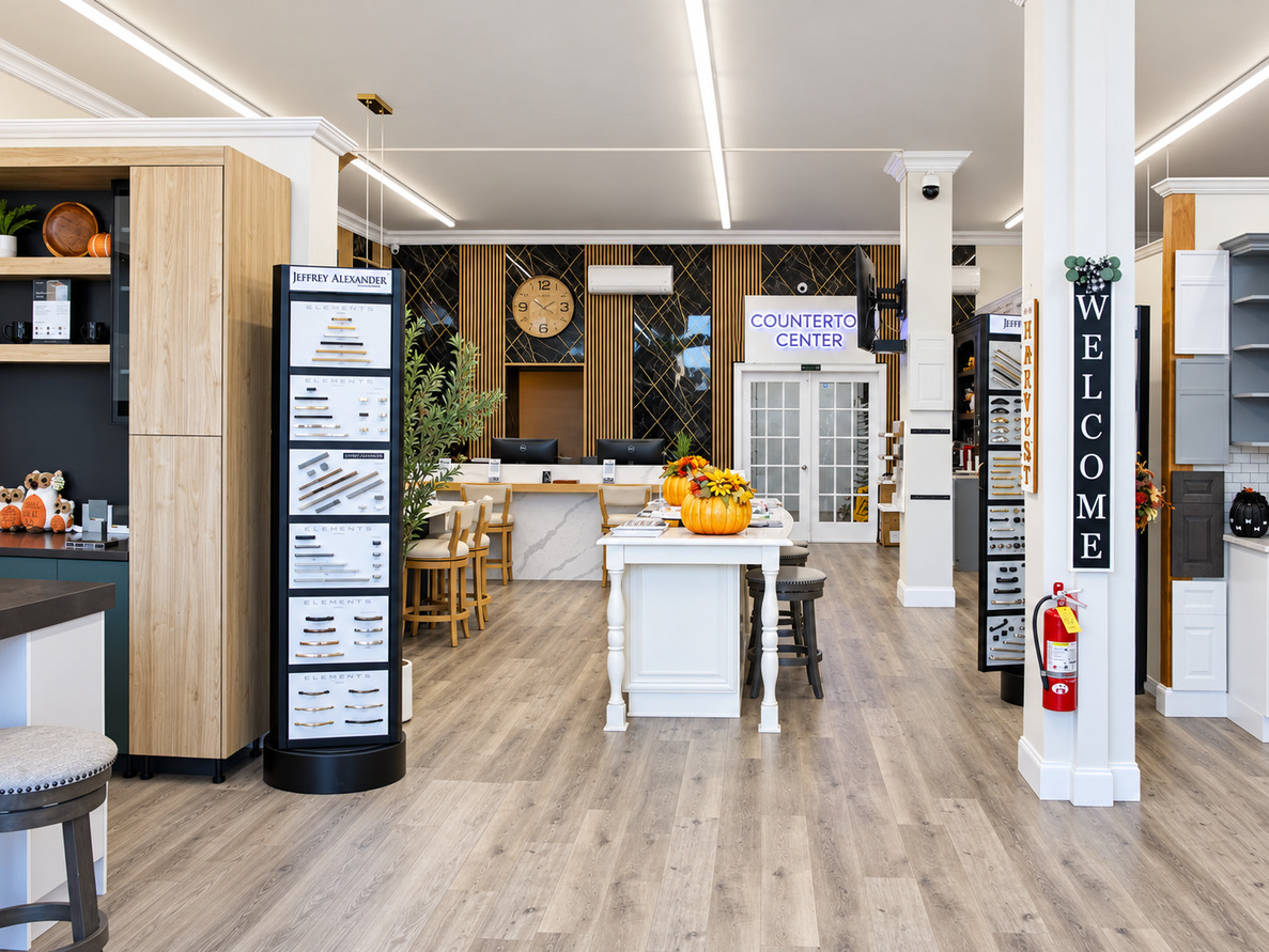 Cabinet hardware displays and kitchen cabinets inside the Kitchen Factory Newark showroom