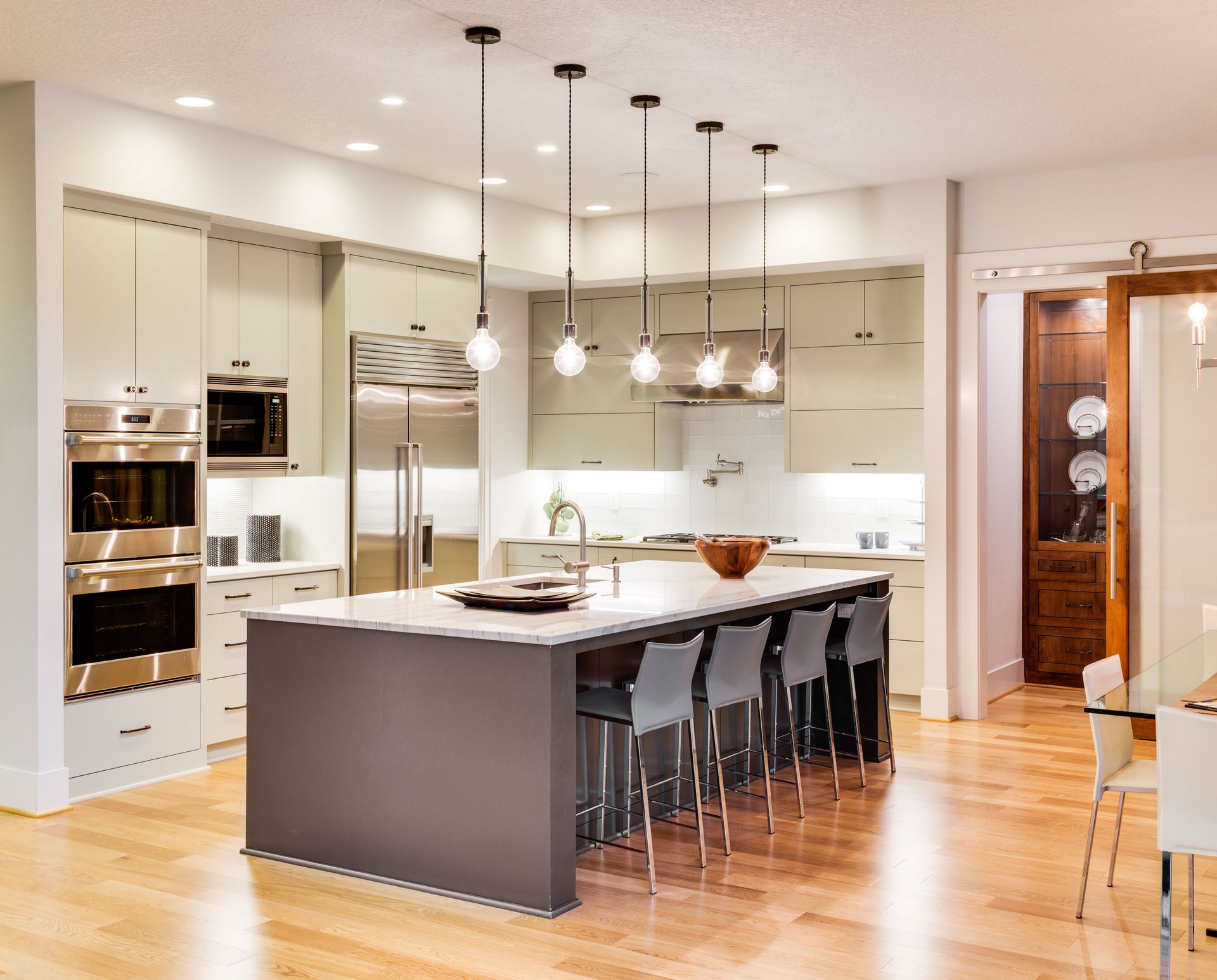 sage flat panel kitchen cabinets gray island white countertop
